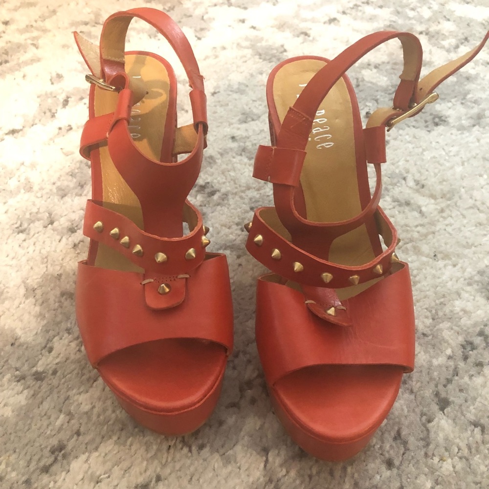Never worn Red studded heels